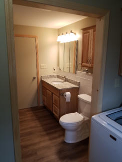bathroom with laminate flooring